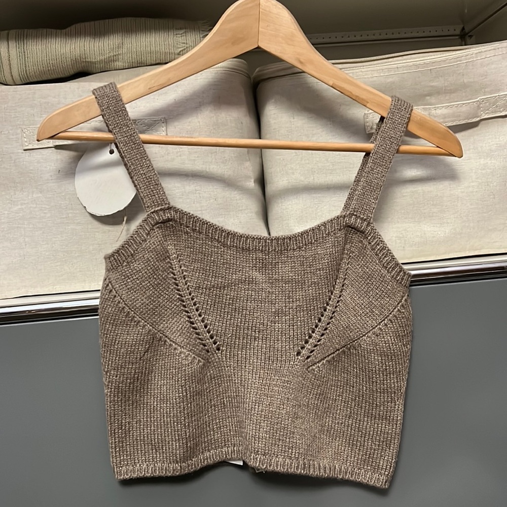 Knit cropped tank top with detailed stitching. Size S